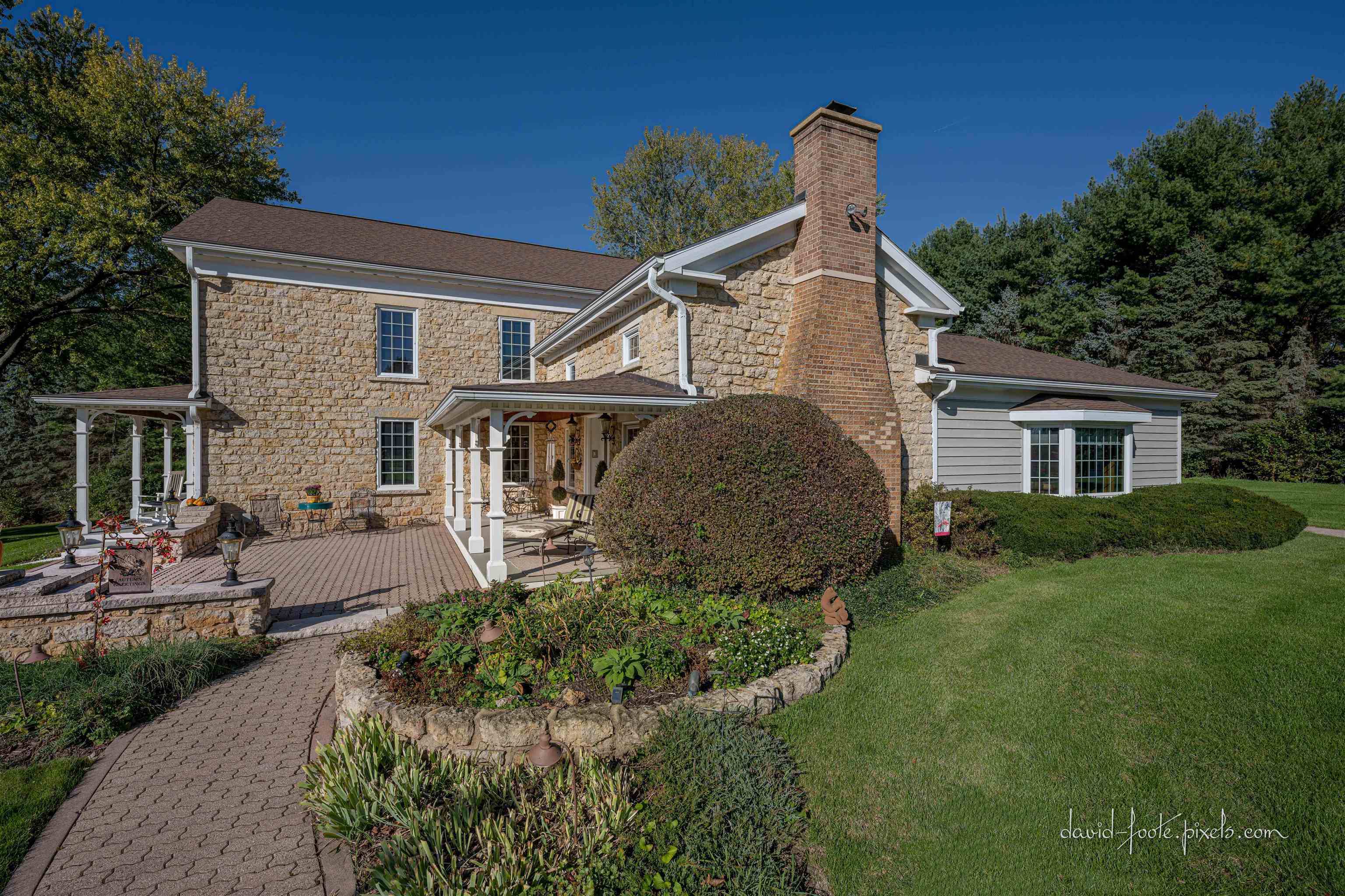 8936 North Cedarville Road Lena, IL 61048 - Photo 4 of 51 a front view of a house with a yard