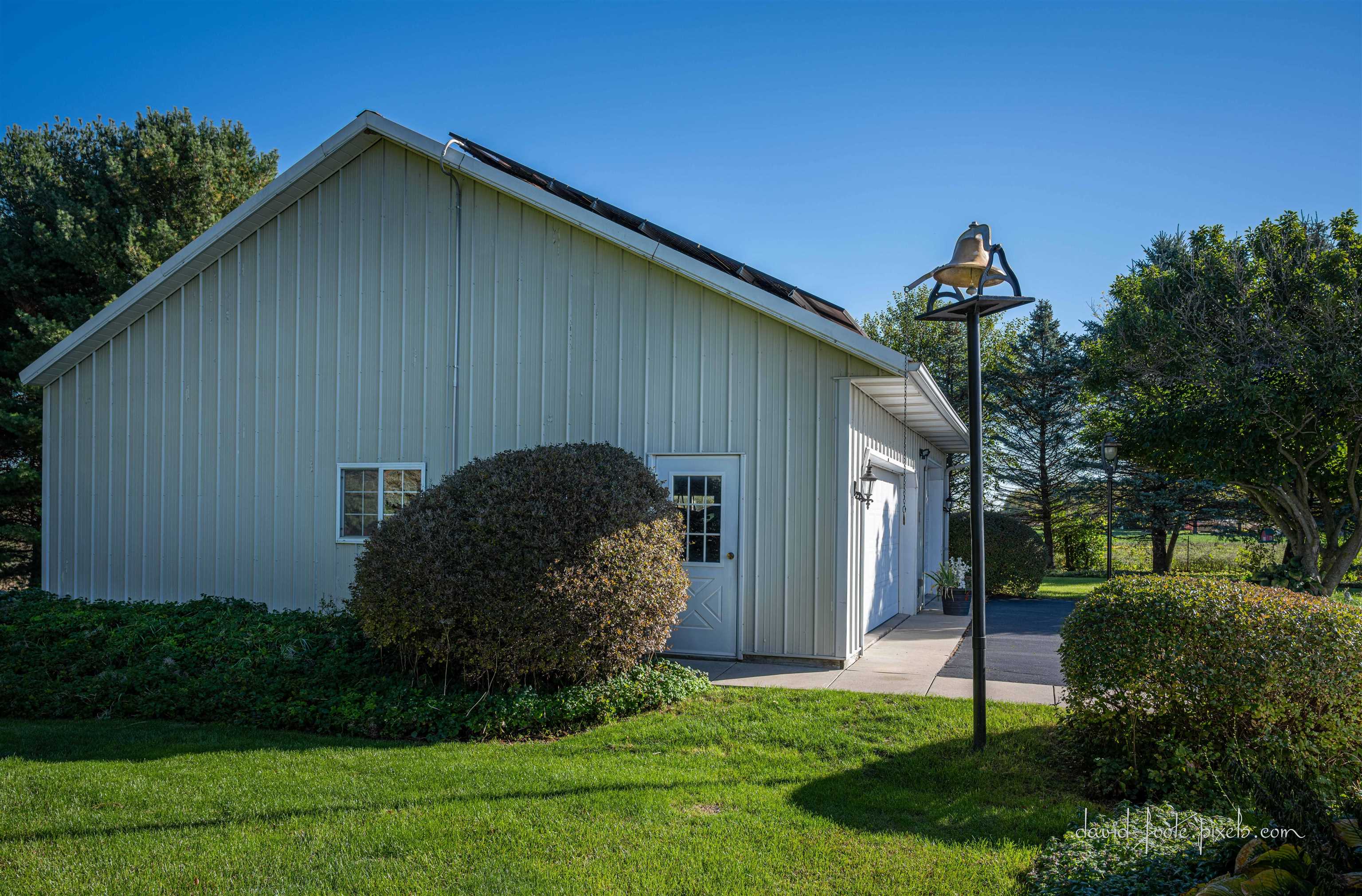 8936 North Cedarville Road Lena, IL 61048 - Photo 44 of 51 a backyard of a house with lots of green space