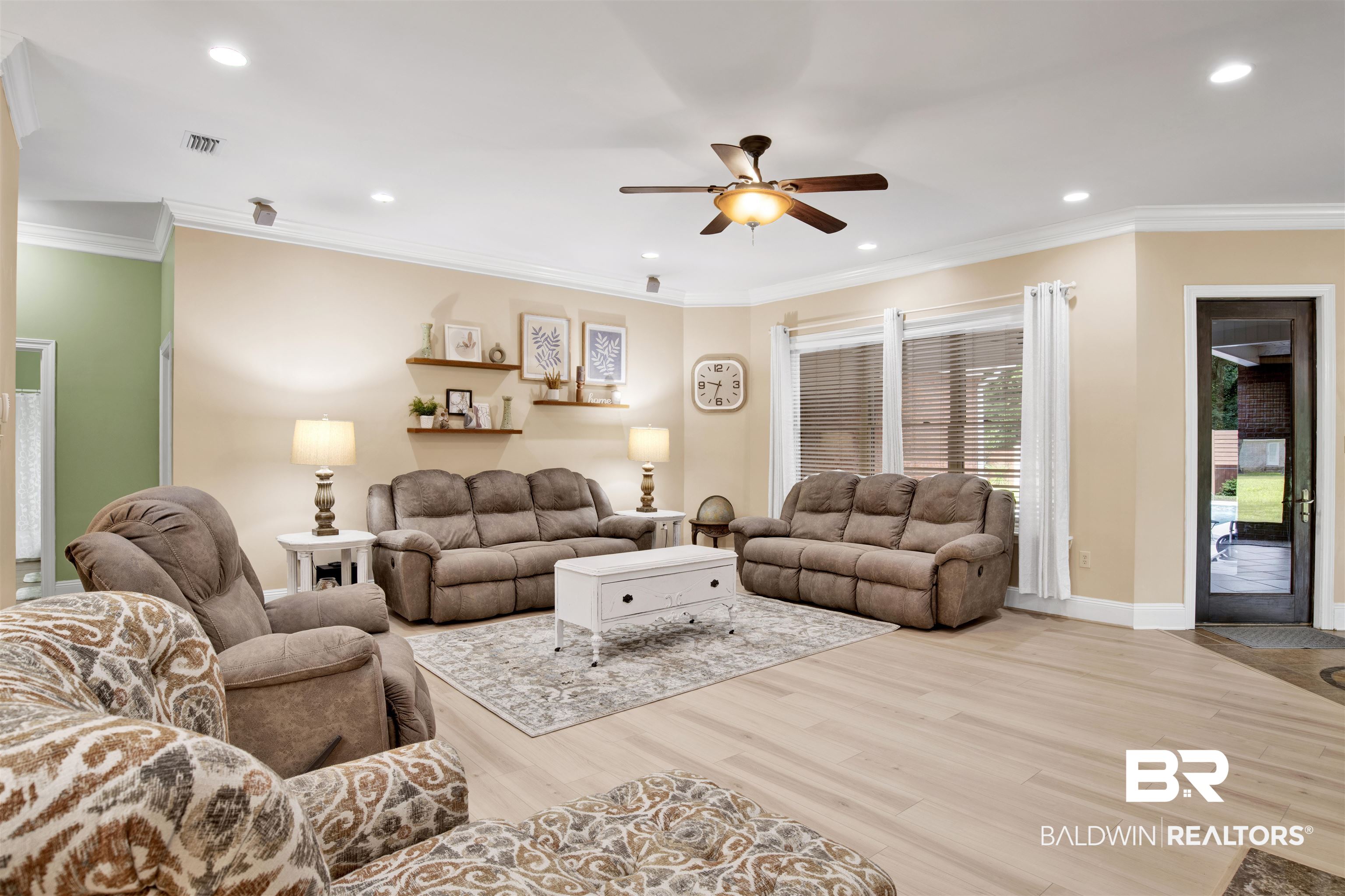 4340 Hamilton Oaks Lane Mobile, AL 36695 - Photo 10 of 51 Living room with ornamental molding, ceiling fan, and light wood-type flooring