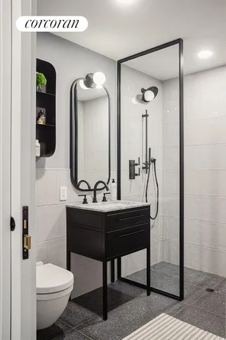 a view of a hallway with washer and dryer