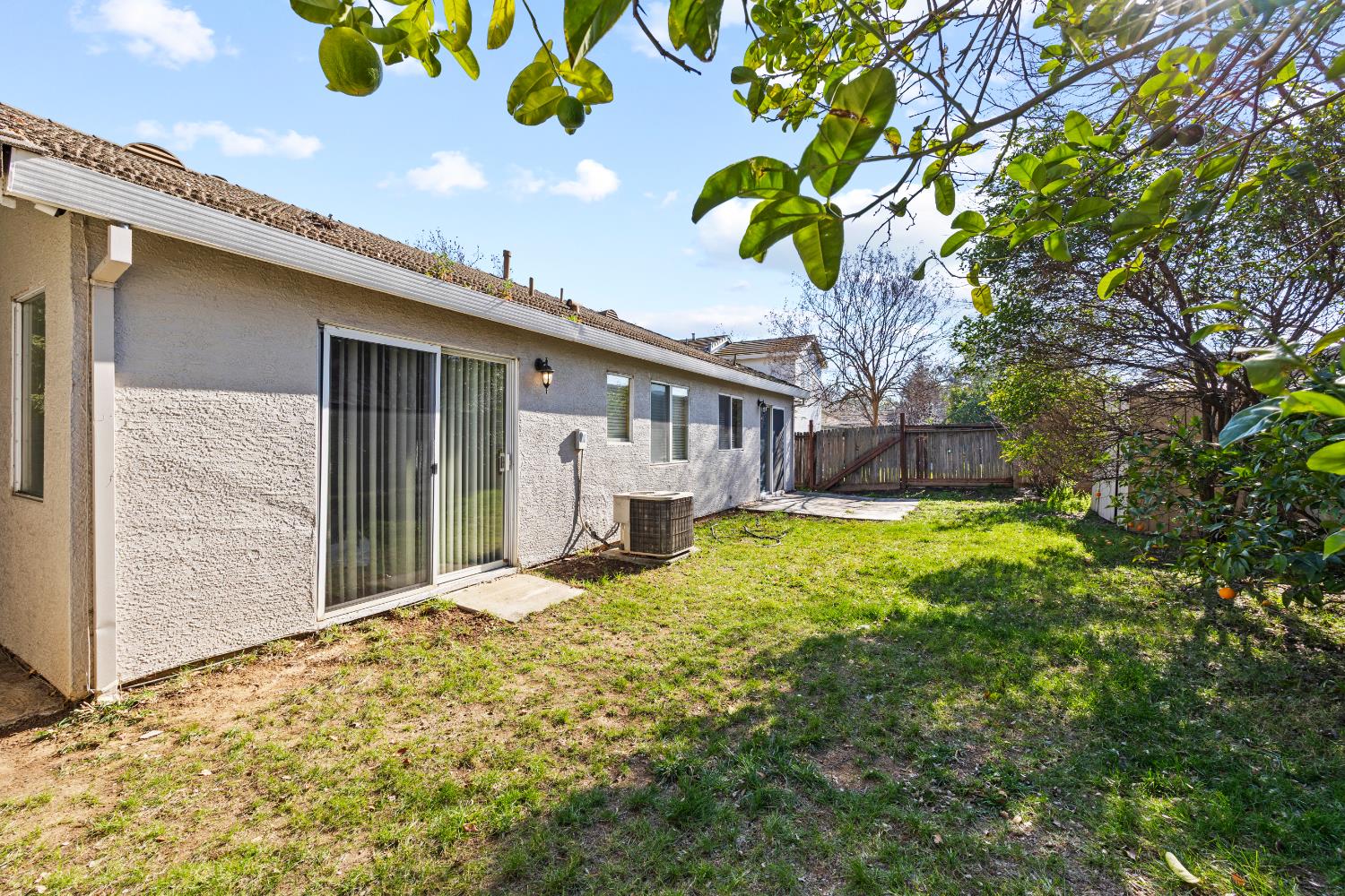 8926 Generations Court Elk Grove, CA 95758 - Photo 23 of 23 a front view of a house with a garden