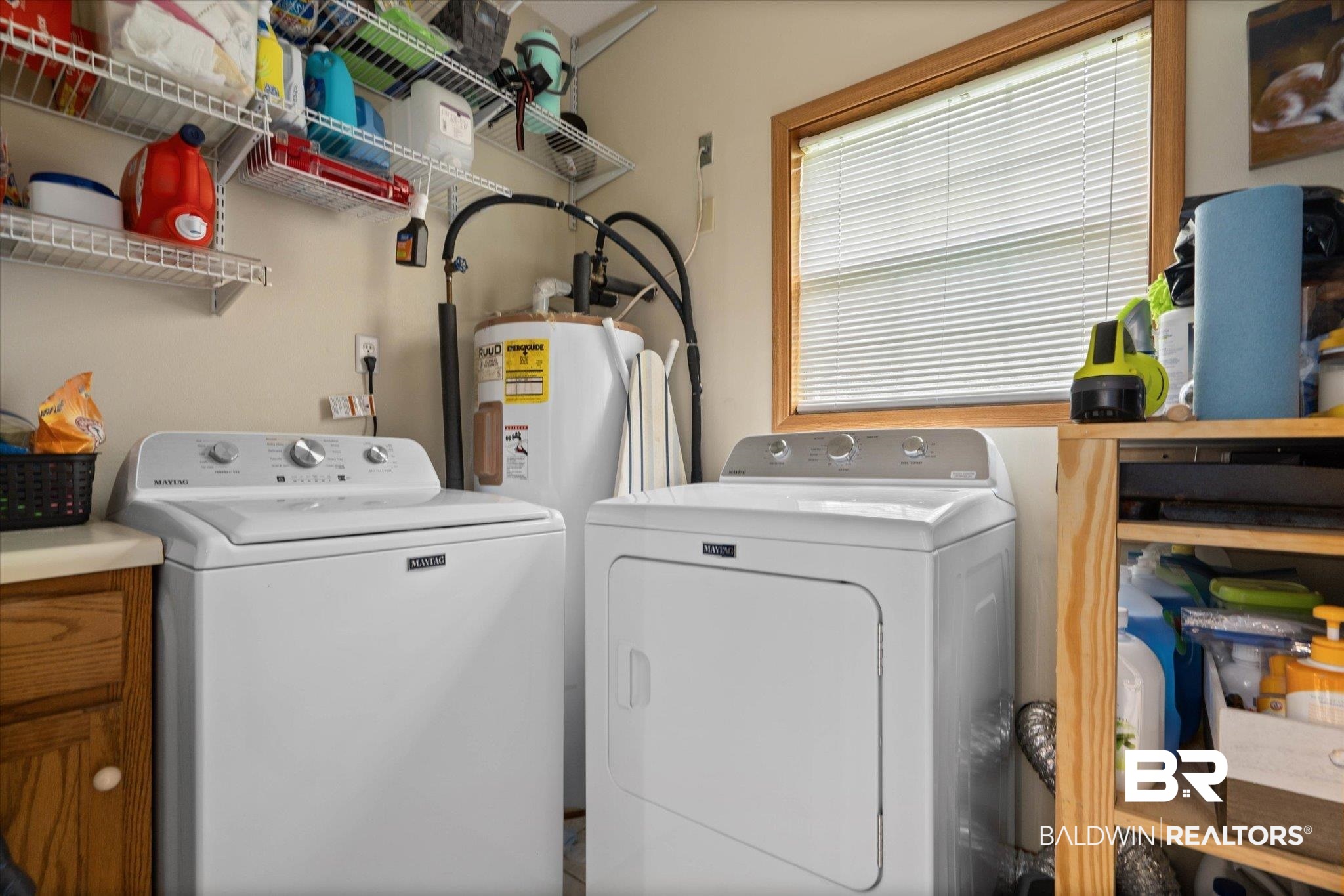 2300 Radcliff Road Saraland, AL 36571 - Photo 17 of 56 Laundry room with separate washer and dryer, water heater, and cabinet space