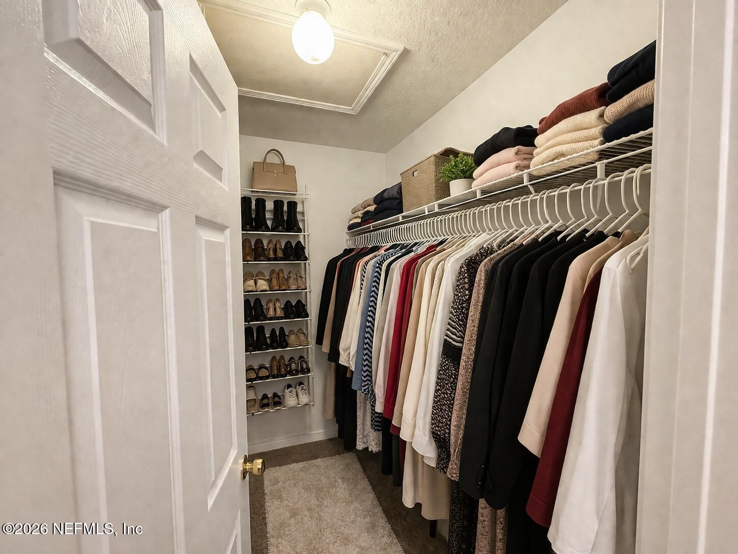 5260 Collins Road, Unit 106 Jacksonville, FL 32244 - Photo 15 of 20 Primary Closet