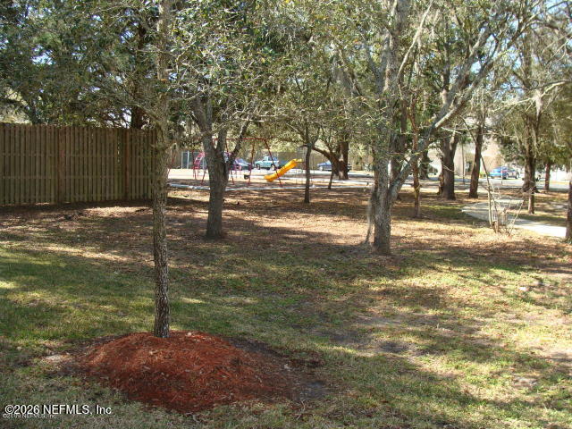 5260 Collins Road, Unit 106 Jacksonville, FL 32244 - Photo 3 of 20 Side Yard