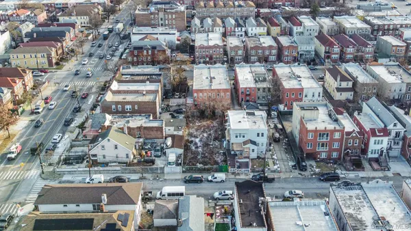 an aerial view of a city with lots of residential buildings