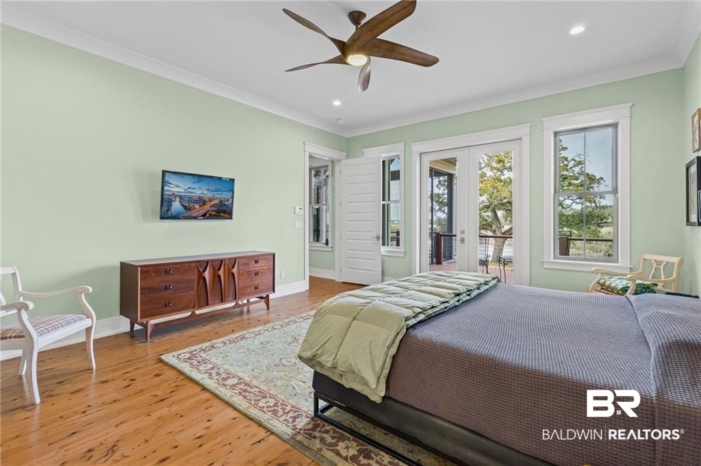 2730 Gator Road Mobile, AL 36605 - Photo 16 of 42 Bedroom with french doors, light wood-type flooring, crown molding, recessed lighting, and access to outside
