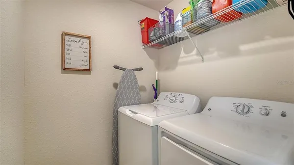 a view of a lake with a yard