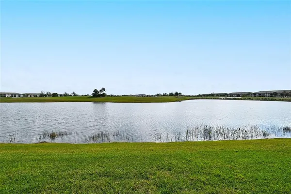 a view of a lake with a city