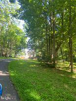 7575 Moormont Road Rapidan, VA 22733 - Photo 14 of 59 a view of a field with an trees