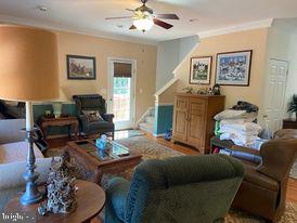 7575 Moormont Road Rapidan, VA 22733 - Photo 30 of 59 a living room with furniture and a fireplace
