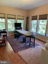 7575 Moormont Road Rapidan, VA 22733 - Photo 48 of 59 a living room with furniture and a flat screen tv