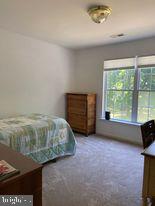 7575 Moormont Road Rapidan, VA 22733 - Photo 51 of 59 a room with a bed and a window