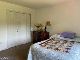 7575 Moormont Road Rapidan, VA 22733 - Photo 52 of 59 a bedroom with a bed and a dresser