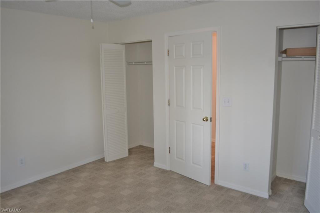 240 Timber Lake Circle, Unit D202 Naples, FL 34104 - Photo 9 of 23 a view of an empty room