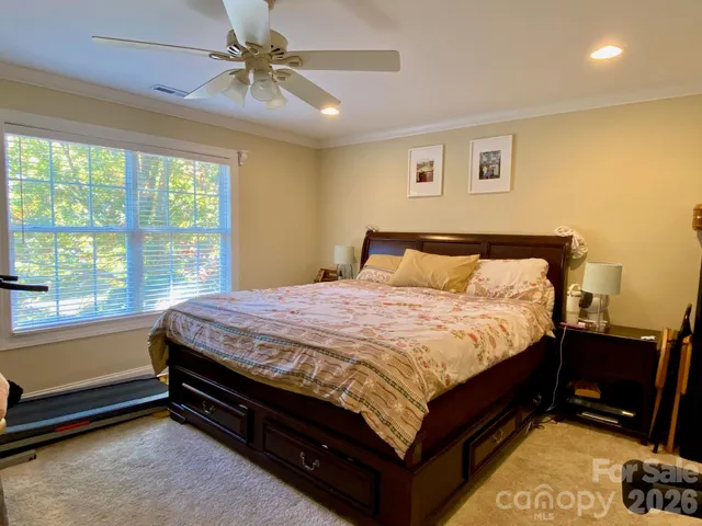 a bathroom with a tub and a shower