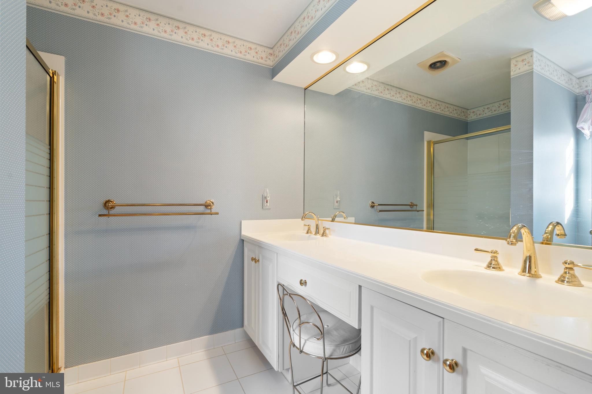 119 East Padonia Road Lutherville-Timonium, MD 21093 - Photo 17 of 39 a bathroom with a sink and a mirror