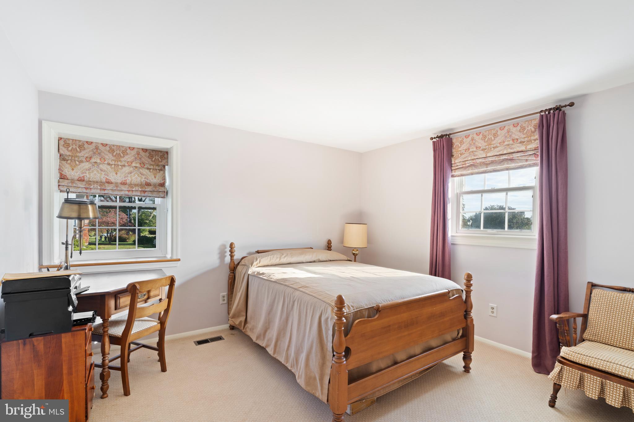 119 East Padonia Road Lutherville-Timonium, MD 21093 - Photo 18 of 39 a bedroom with a bed and a window