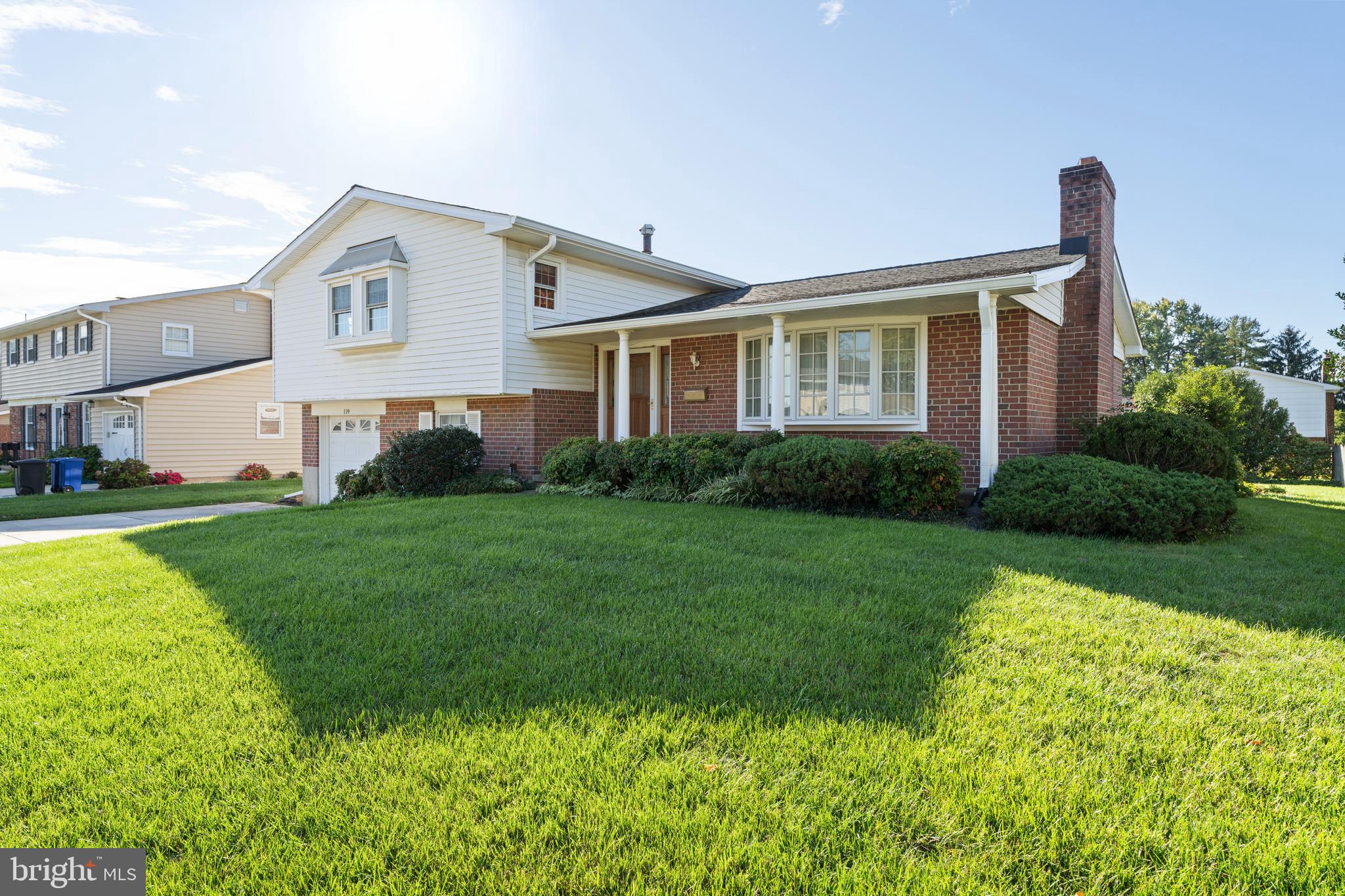 119 East Padonia Road Lutherville-Timonium, MD 21093 - Photo 2 of 39 a front view of a house with garden
