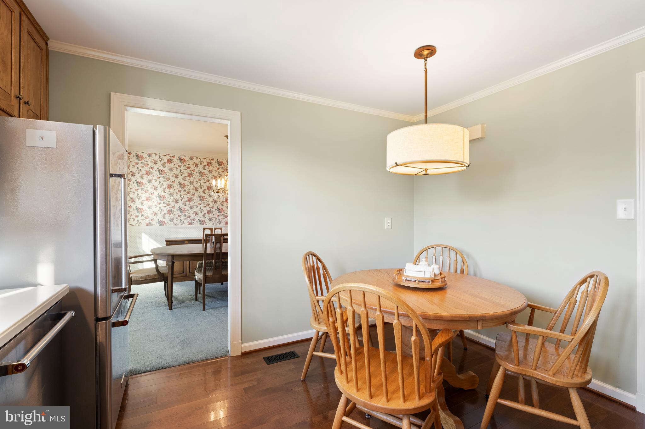119 East Padonia Road Lutherville-Timonium, MD 21093 - Photo 8 of 39 a view of a dining room with furniture window and wooden floor