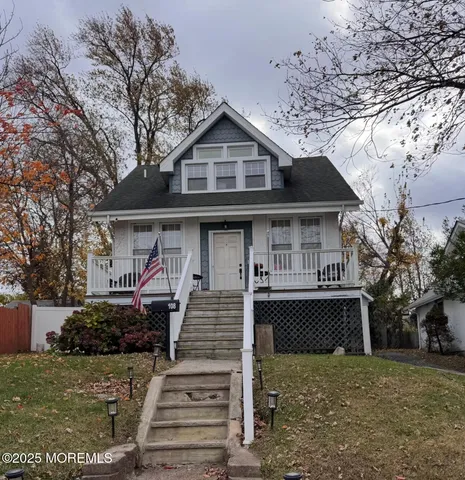 a front view of a house with garage