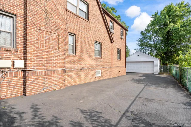 a view of a house with a street