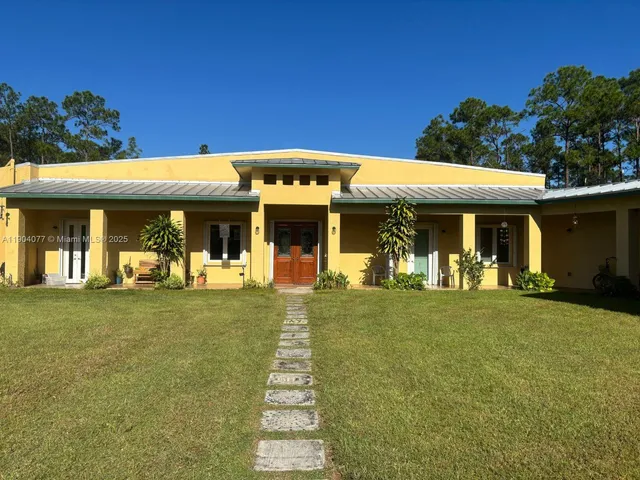 a front view of a house having patio area