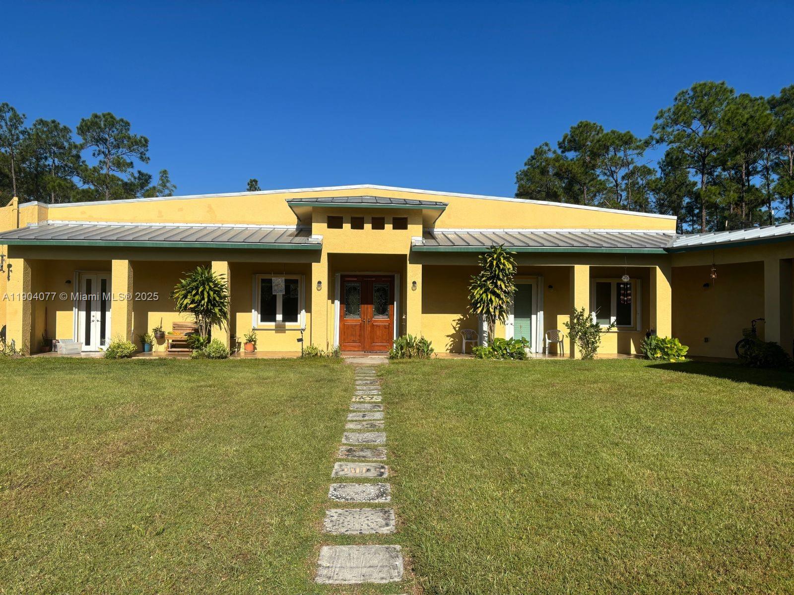 a front view of a house having patio area