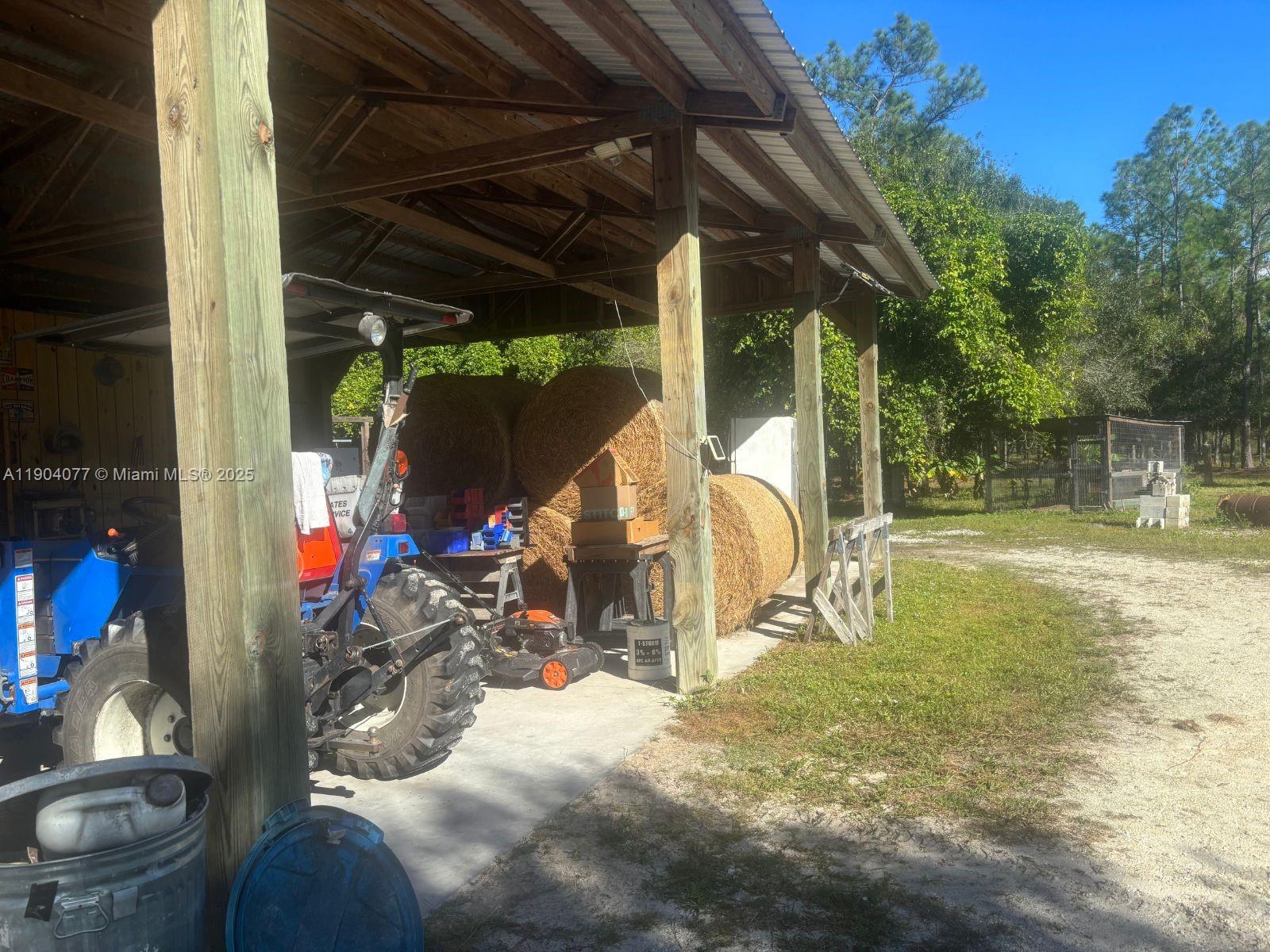2184 9 Mile Road LaBelle, FL 33935 - Photo 24 of 41 a view of outdoor space yard and patio