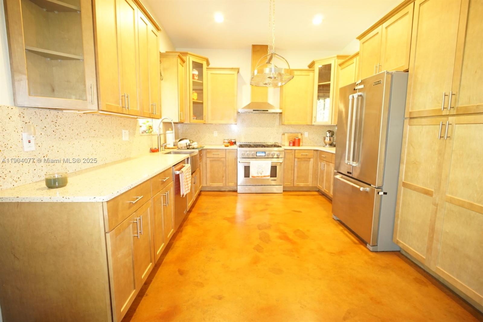 2184 9 Mile Road LaBelle, FL 33935 - Photo 10 of 41 a large white kitchen with a large window