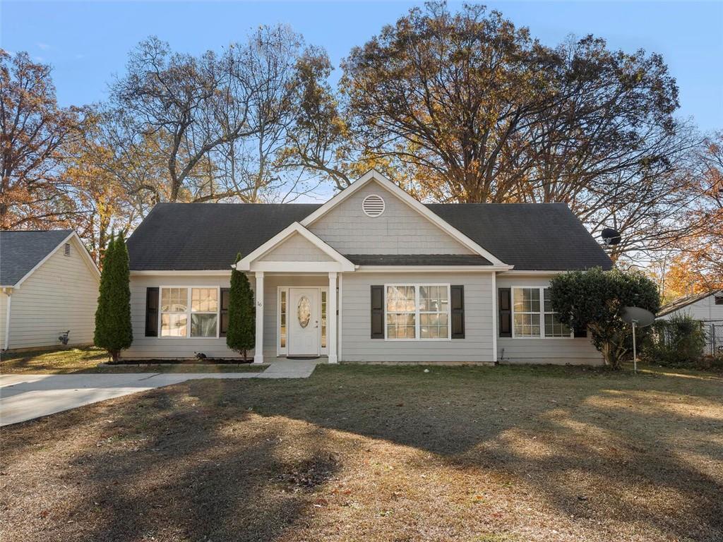 front view of a house with a yard