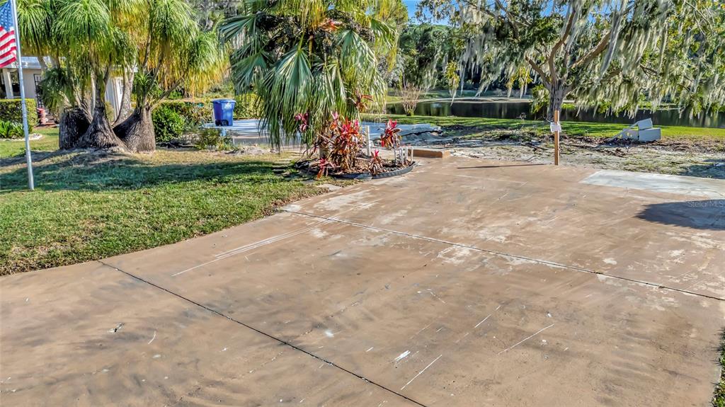 722 Landry Lane Tavares, FL 32778 - Photo 11 of 17 a view of a park with swings and slides