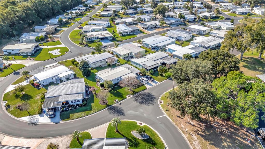 722 Landry Lane Tavares, FL 32778 - Photo 17 of 17 an aerial view of residential houses with outdoor space