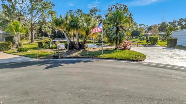 a view of an outdoor space and tennis court