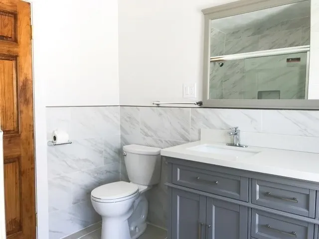 a bathroom with a sink and a toilet
