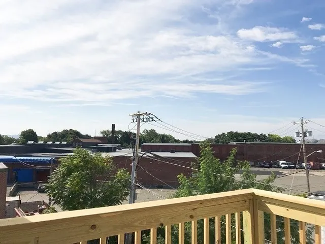 a view of a city from a balcony