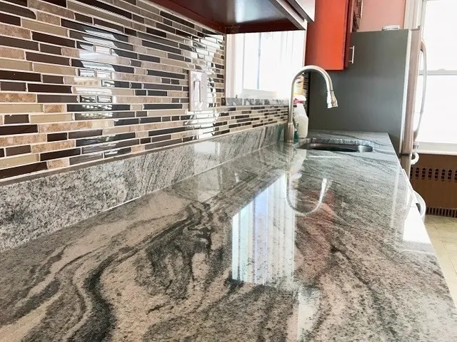 a kitchen with a sink and a stove