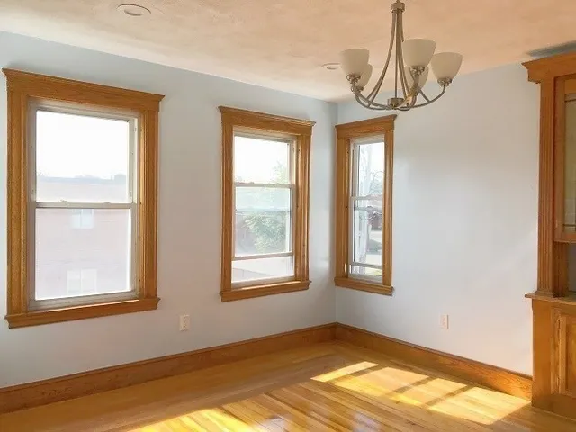 a view of empty room with windows