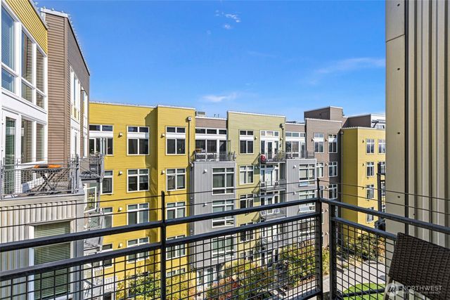 a view of a city with tall buildings