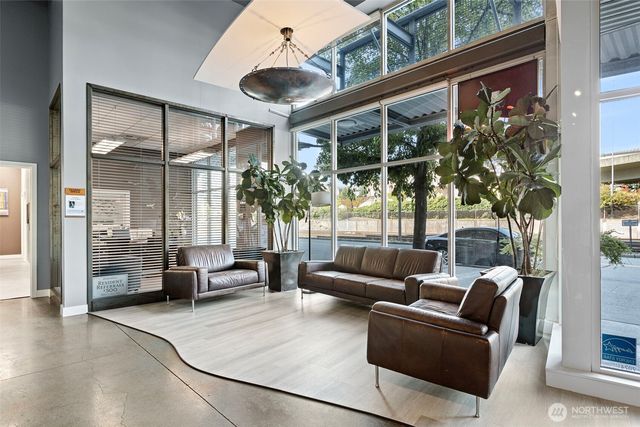a living room with furniture and a table