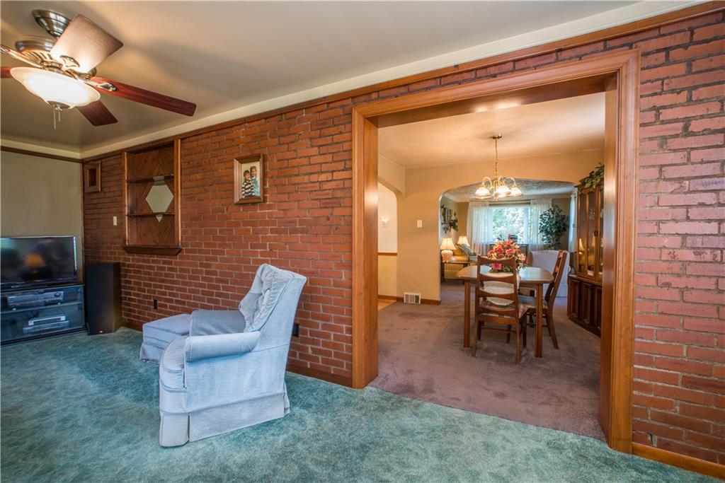 740 Agnew Road Pittsburgh, PA 15227 - Photo 12 of 25 The first floor family room is right off of the dinning room.