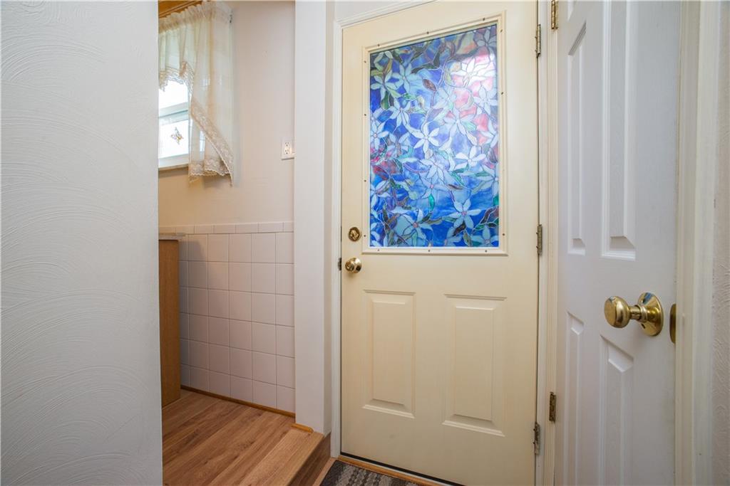 740 Agnew Road Pittsburgh, PA 15227 - Photo 23 of 25 This stained glass on the back door leads to an extra large back yard.