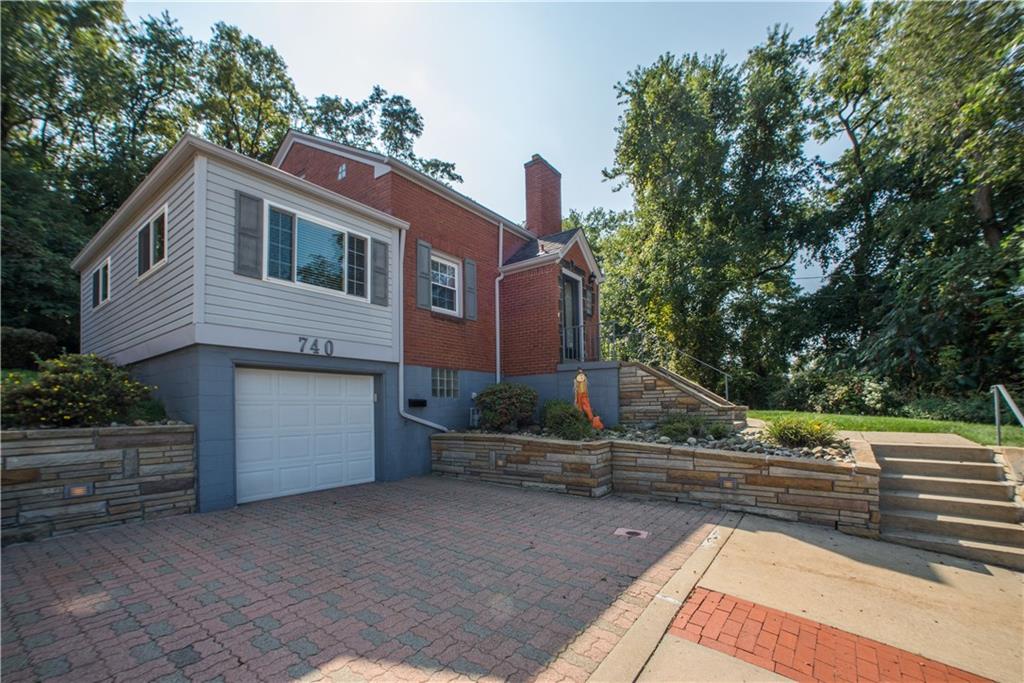 740 Agnew Road Pittsburgh, PA 15227 - Photo 4 of 25 Notice the Omni-stone landing at the top of the driveway and recessed lighting in stone wall.