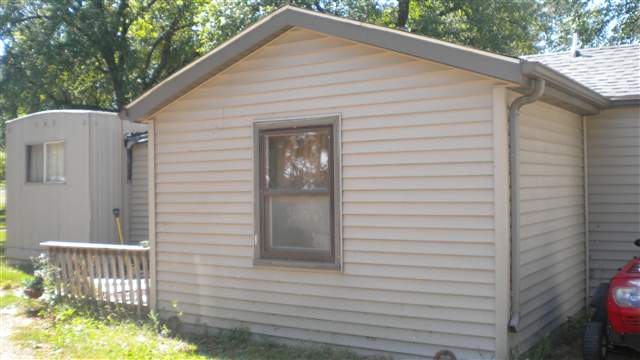 7369-7379 Riverview Road Thomson, IL 61285 - Photo 5 of 5 a view of a house with a yard