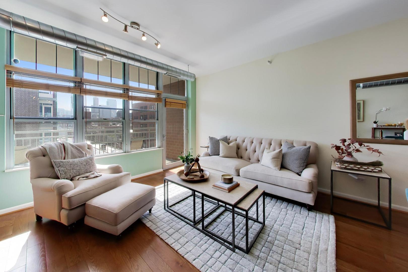 1200 West Monroe Street, Unit 502 Chicago, IL 60607 - Photo 2 of 34 a living room with furniture and a flat screen tv
