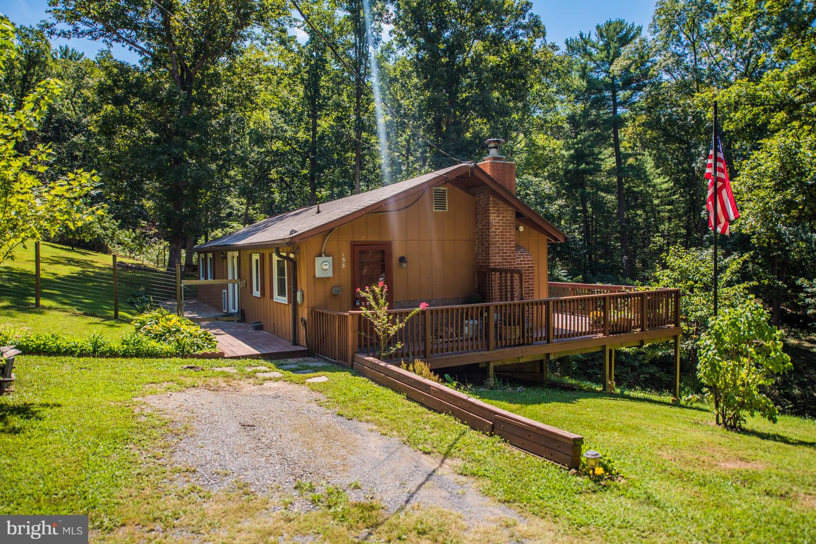 Porch wraps around 4 sides of home