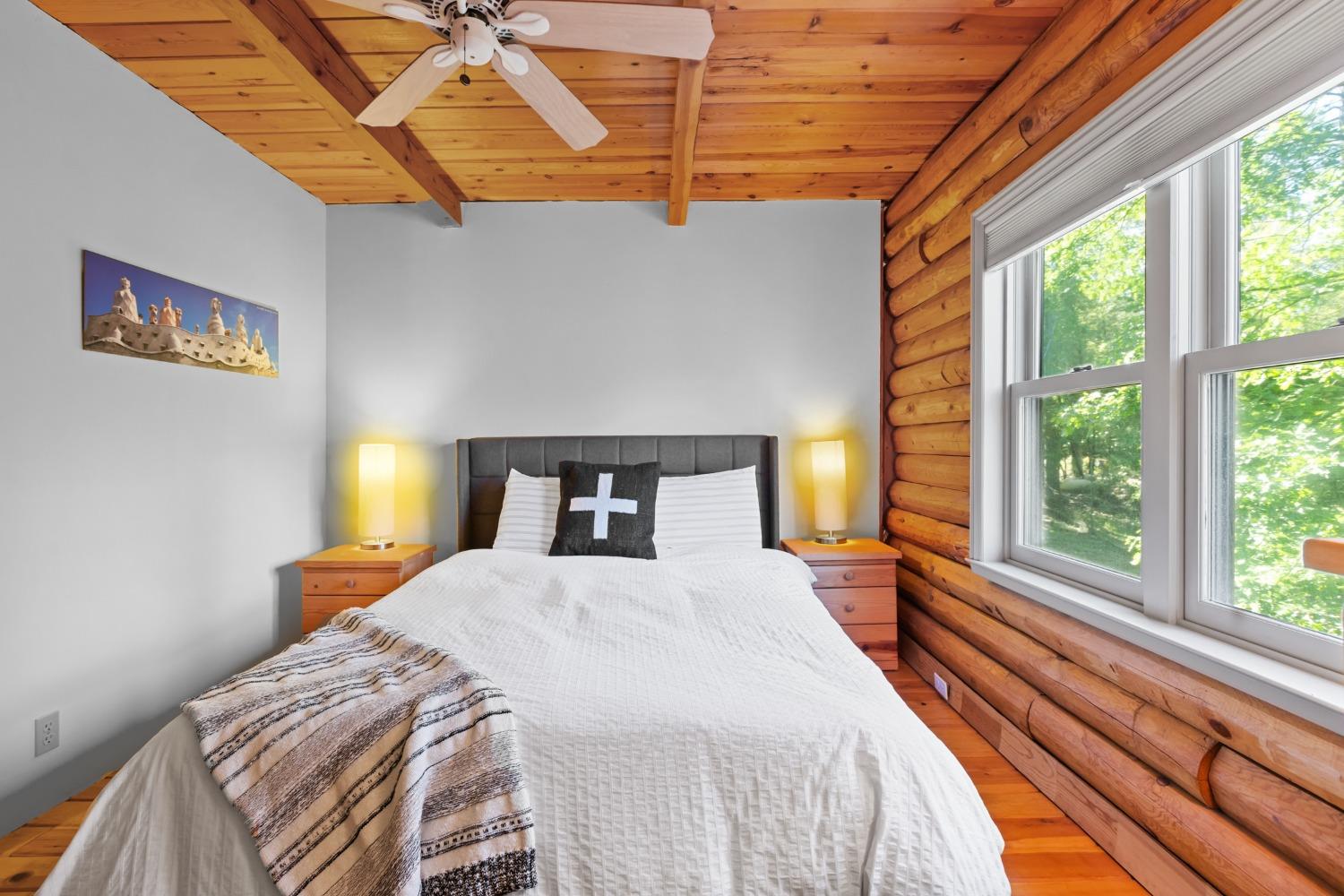 15250 Mitchell Mine Road Pine Grove, CA 95665 - Photo 32 of 50 a bedroom with a bed and a view of balcony