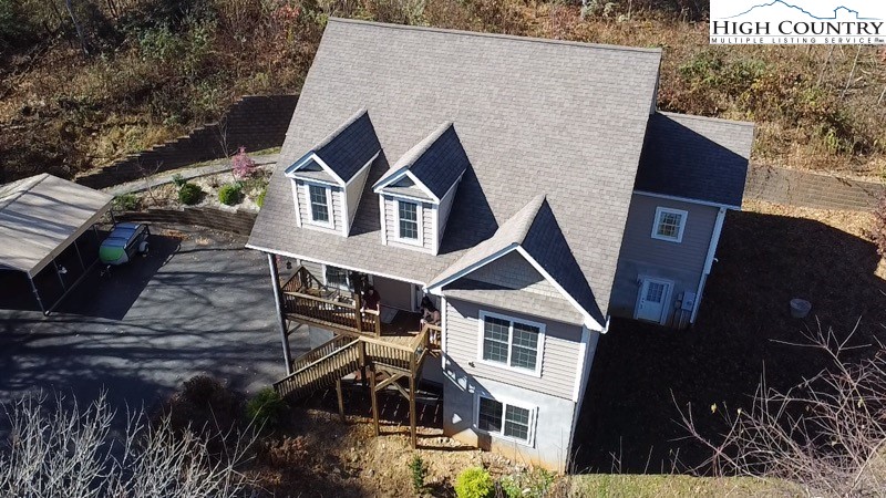 778 Roby Poe Road Crumpler, NC 28617 - Photo 2 of 50 a front view of a house with windows