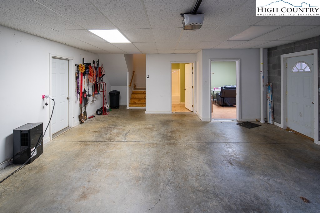 778 Roby Poe Road Crumpler, NC 28617 - Photo 38 of 50 a view of a livingroom with a furniture and closet