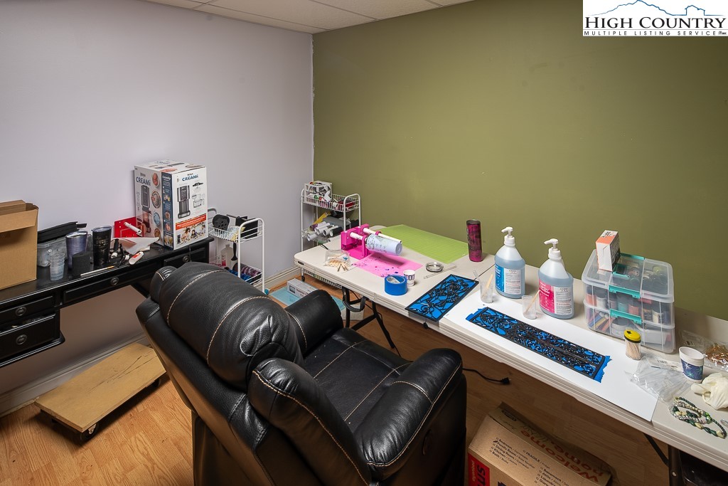 778 Roby Poe Road Crumpler, NC 28617 - Photo 39 of 50 a reading room with furniture and a wooden floor