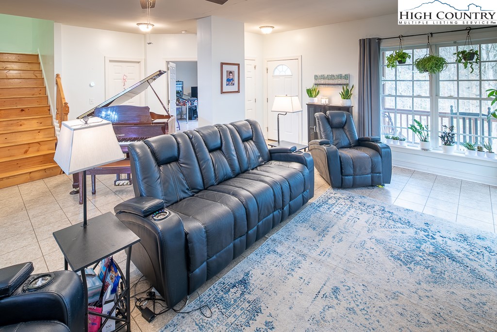 778 Roby Poe Road Crumpler, NC 28617 - Photo 8 of 50 a living room with furniture and a window